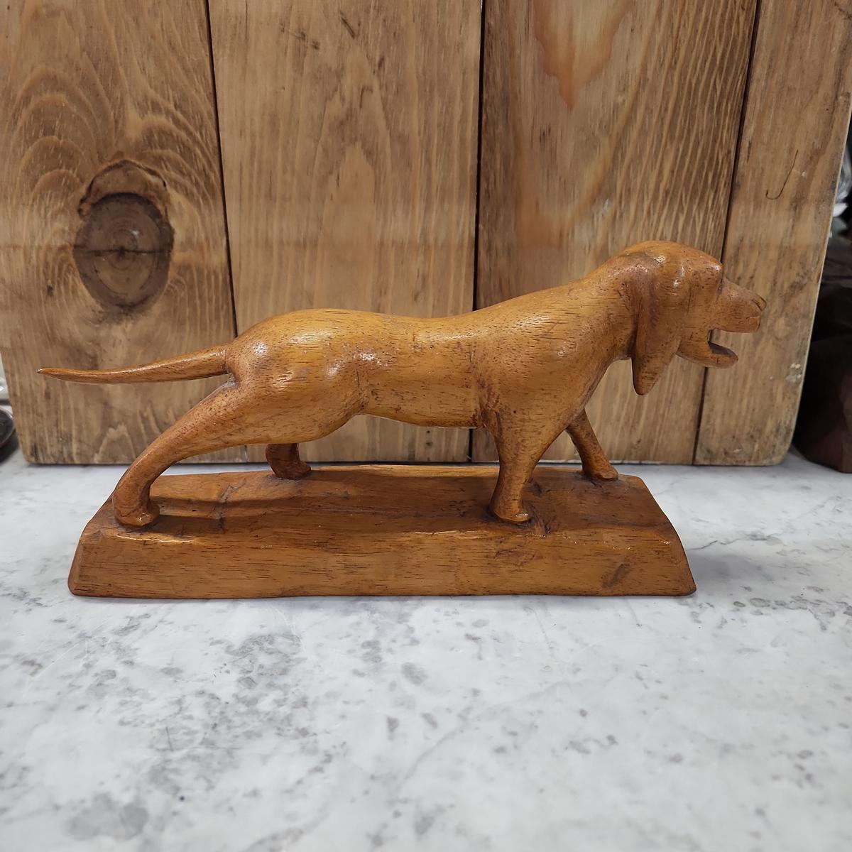 WOOD CARVING OF A DOG
